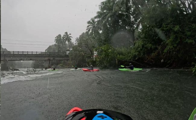 Kayaking down a rapid
