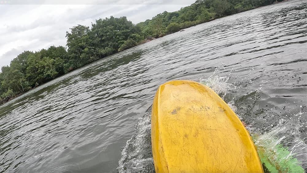 Student rolling in the river