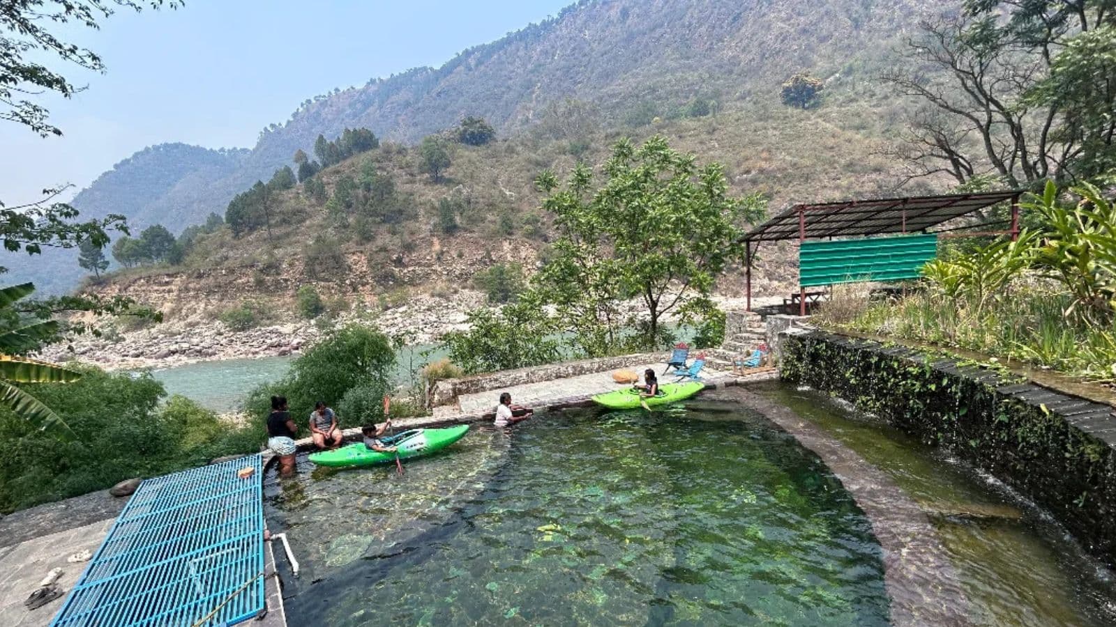 Kids enjoying a pool kayak session