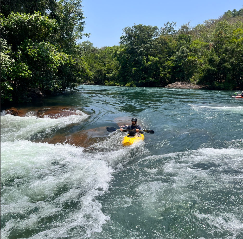 Navigating the Kali River in a kayak
